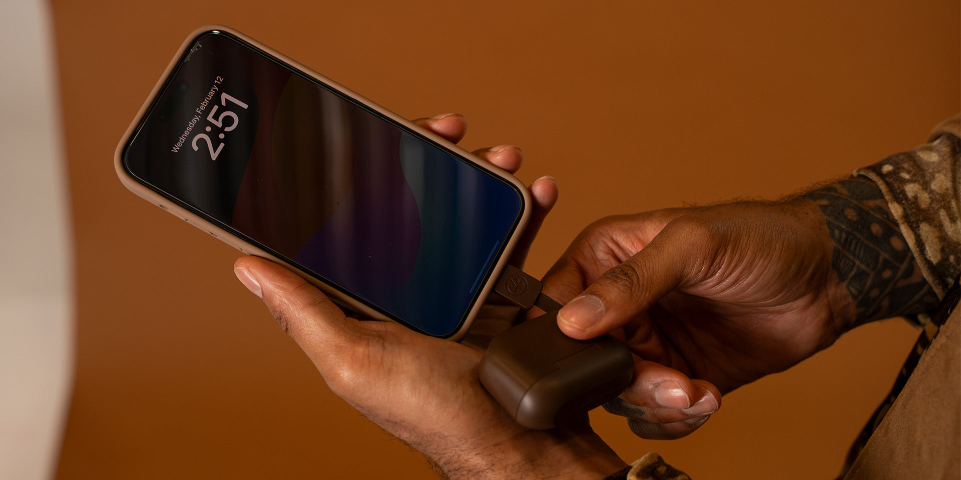 JLab-GoTones_-Lifestyle-4975C Phone Charging