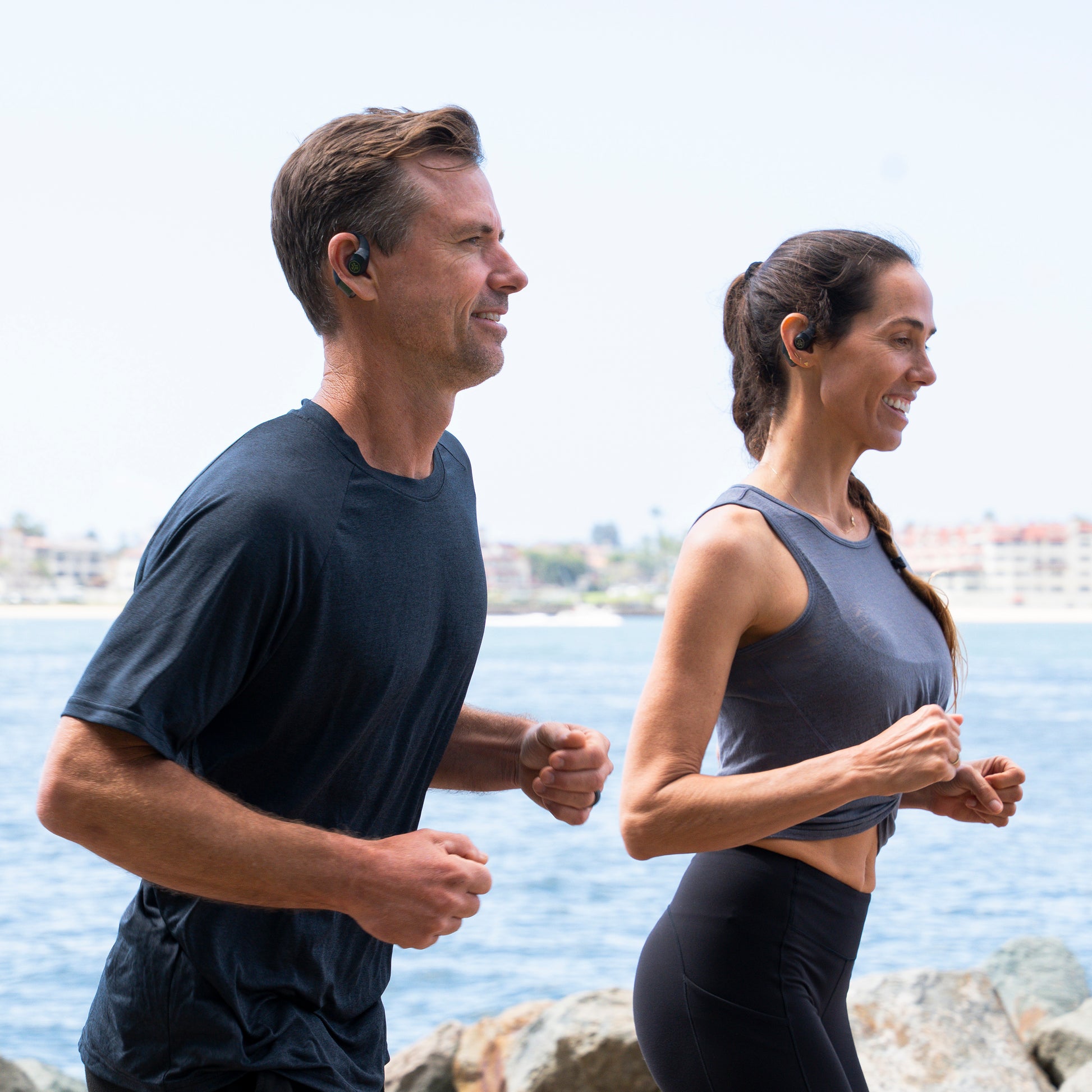 Epic open sport earbuds couple running